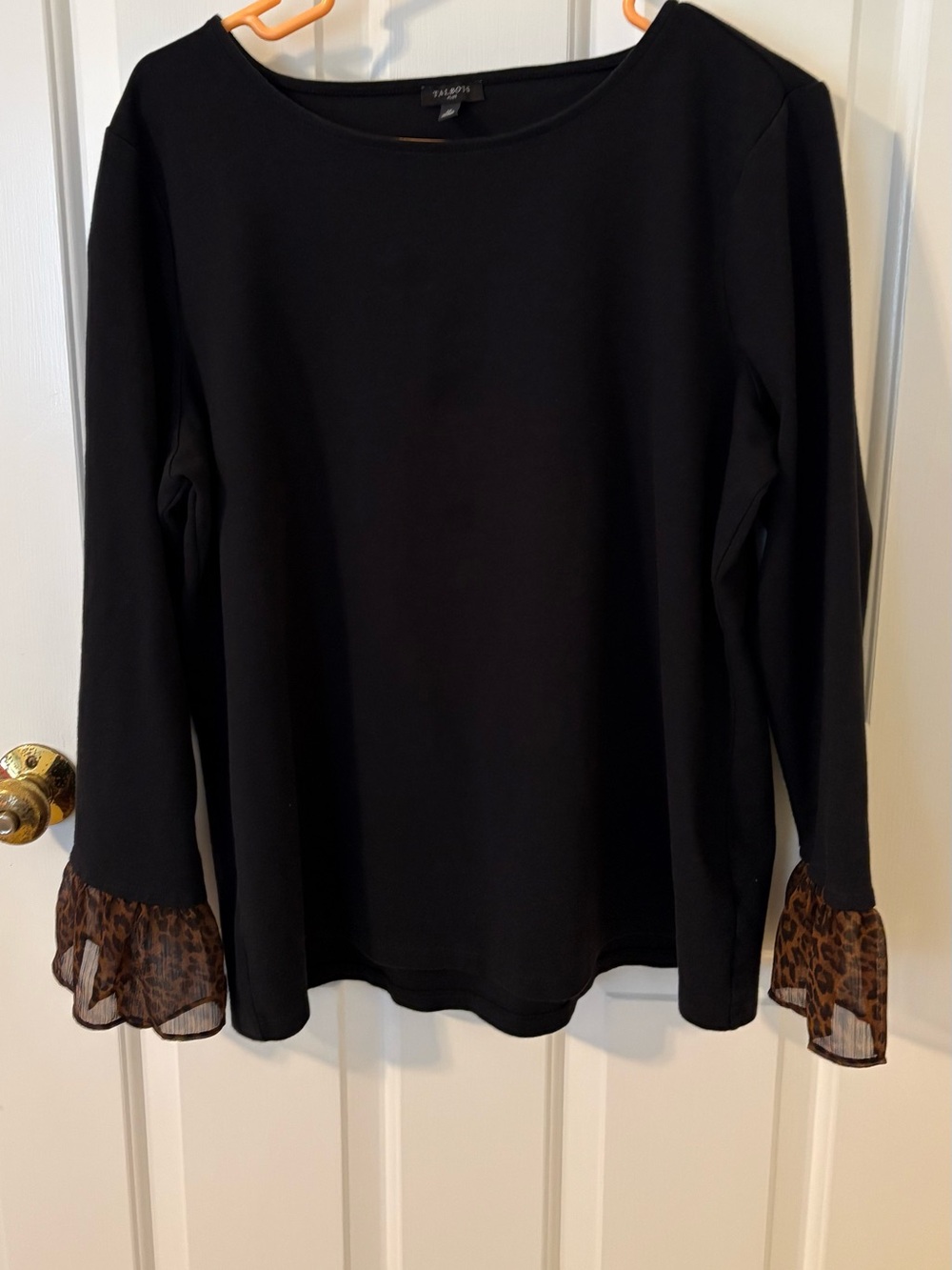 Black knit tee with animal print cuff